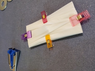 31 31. Wrap bias tape around cardboard for future use